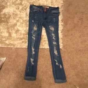 Skinny blue ripped jeans